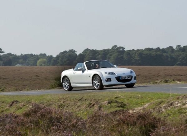 2014 Mazda MX5 Roadster Coupe Artist: Unknown.