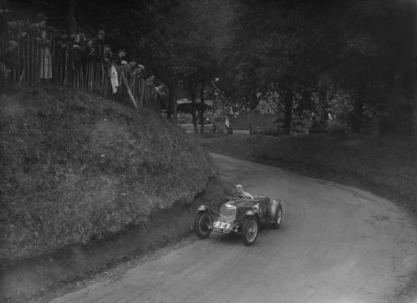 Riley TT Sprite competing in the Shelsley Walsh Hillclimb, Worcestershire, 1935. Artist: Bill Brunell.