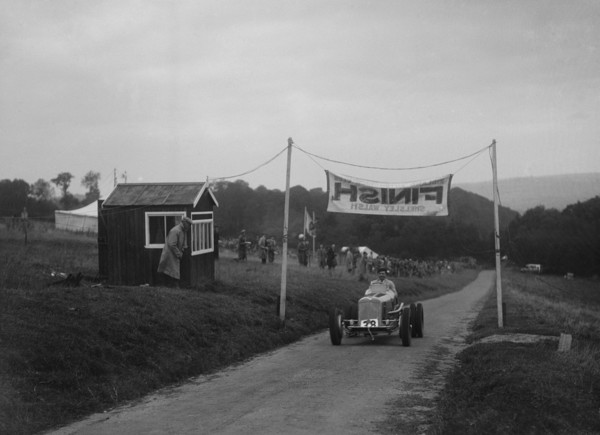 ERA of Raymond Mays at the finishing line of the Shelsley Walsh Hillclimb, Worcestershire, 1935. Artist: Bill Brunell.