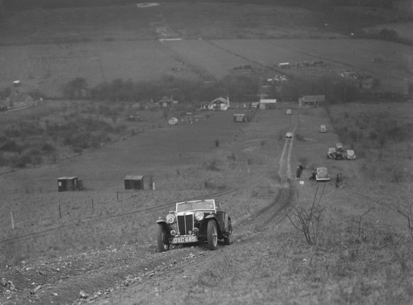 MG TA competing in the London Motor Club Coventry Cup Trial, Knatts Hill, Kent, 1938. Artist: Bill Brunell.