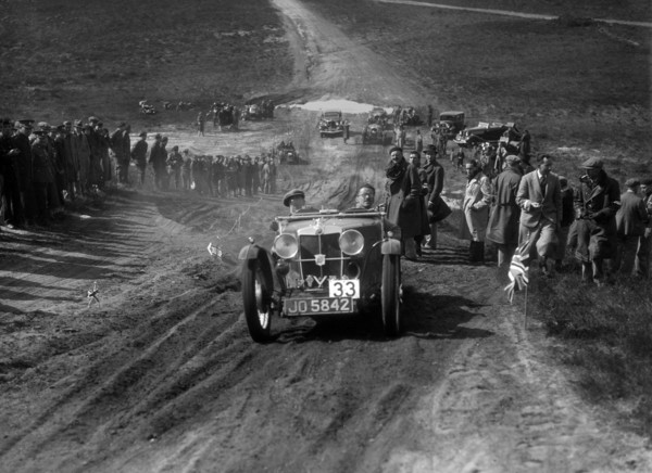 1932 MG J2 competing in a motoring trial, Bagshot Heath, Surrey, 1930s. Artist: Bill Brunell.