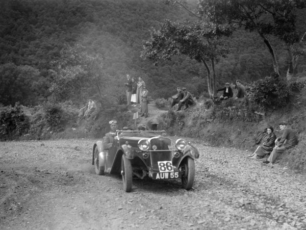 Singer sports 2-seater at the Mid Surrey AC Barnstaple Trial, Beggars Roost, Devon, 1934. Artist: Bill Brunell.
