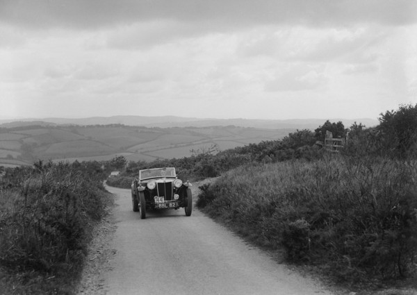 MG TA of RA MacDermid competing in the MCC Torquay Rally, 1938. Artist: Bill Brunell.