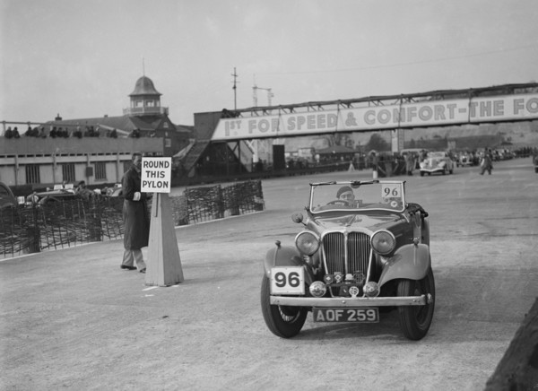 SS 2 competing in the JCC Rally, Brooklands, Surrey, 1939. Artist: Bill Brunell.