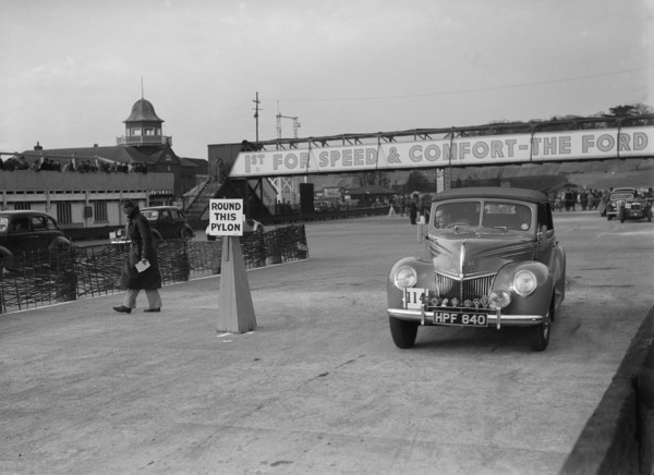 Ford V8 drophead competing in the JCC Rally, Brooklands, Surrey, 1939. Artist: Bill Brunell.