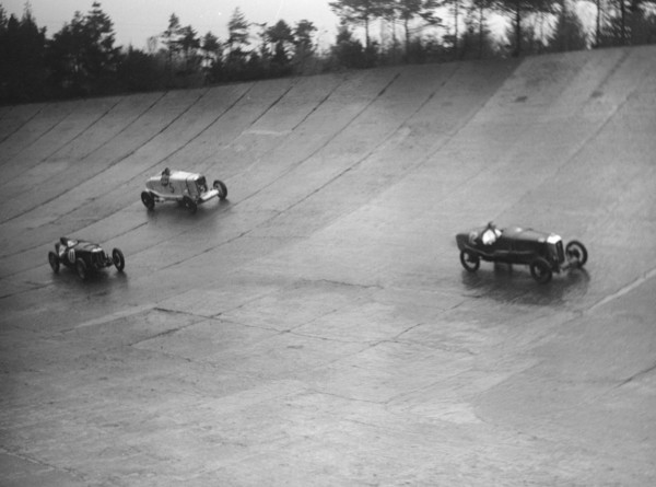 Salmson, Riley 9 Brooklands and Talbot 90 racing at a BARC meeting, Brooklands, Surrey, 1931 Artist: Bill Brunell.