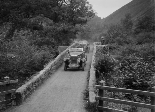 MG M type crossing Figle Bridge during a motoring trial, Devon, c1930s. Artist: Bill Brunell.