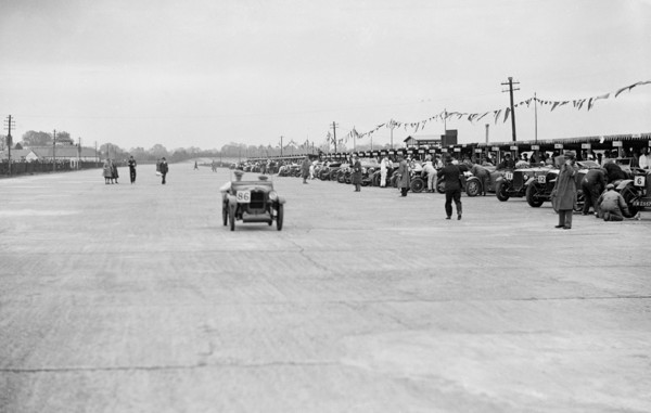Austin 7 of FS and JD Barnes at the JCC Double Twelve Race, Brooklands, Surrey, 1929. Artist: Bill Brunell.