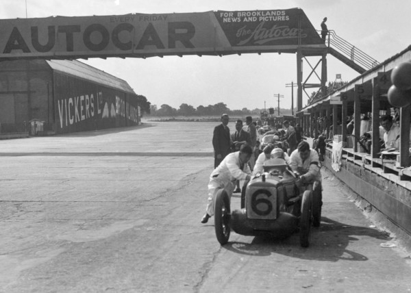 'Rubber Duck', works Austin 7 of Charles Goodacre in the pits, BRDC 500 Mile Race, Brooklands, 1931. Artist: Bill Brunell.
