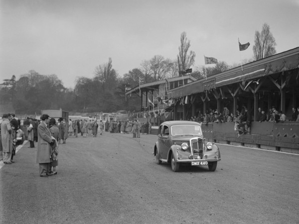 Standard saloon at a race meeting at Crystal Palace, London, 1939. Artist: Bill Brunell.