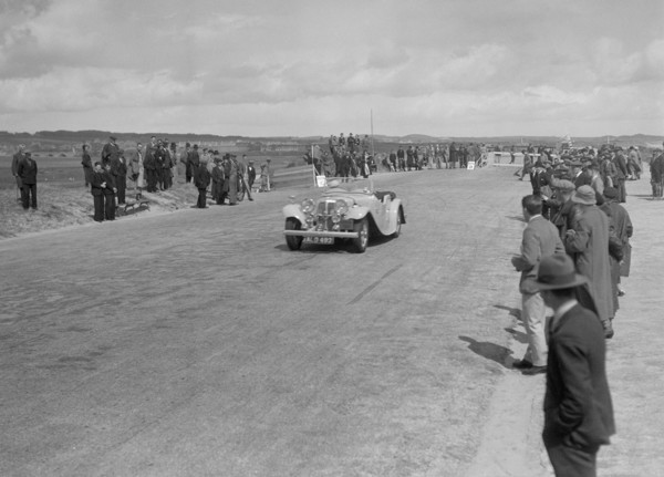 SS 1 4-seater tourer competing in the RSAC Scottish Rally, 1934. Artist: Bill Brunell.