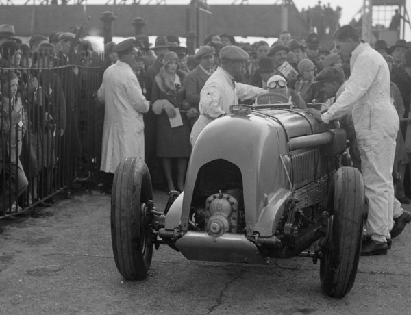Bentley single-seater of Tim Birkin, winner of a race at a BARC meeting, Brooklands, 1930. Artist: Bill Brunell.