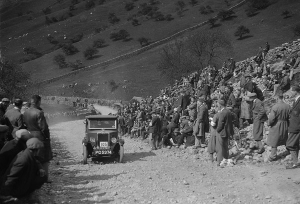 Morris Minor of FWJ Bolton competing in the MCC Edinburgh Trial, Park Rash, Yorkshire Dales, 1930. Artist: Bill Brunell.