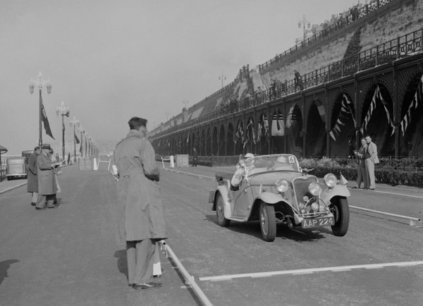 Singer Nine sports of CE Cole at the RAC Rally, Madeira Drive, Brighton, 1939. Artist: Bill Brunell.