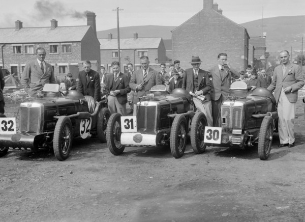 Three MG C type Midgets at the RAC TT Race, Ards Circuit, Belfast, 1932. Artist: Bill Brunell.