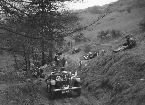 Triumph open tourer competing in the MG Car Club Abingdon Trial/Rally, 1939. Artist: Bill Brunell.