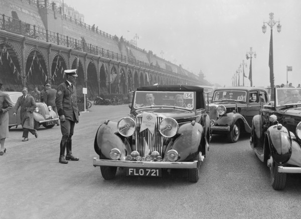Jaguar SS of TH Bridgewater at the RAC Rally, Brighton, Sussex, 1939. Artist: Bill Brunell.