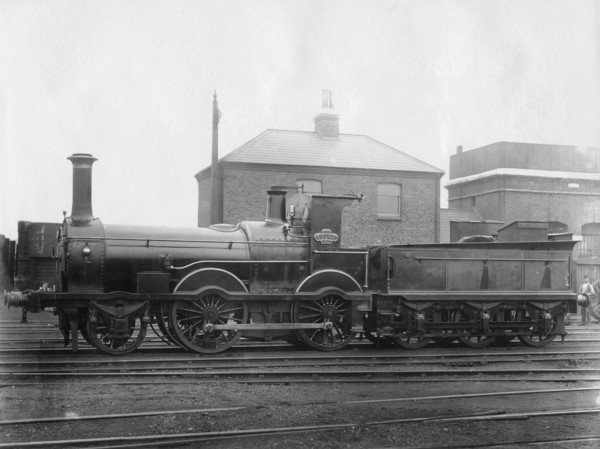London & South Western Railway (LSWR) Locomotive No 148, 'Colne' with its tender, c1880. Artist: Unknown
