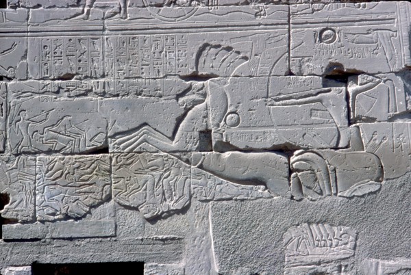 Detail of relief of Pharaoh in chariot riding down his enemies, Temple of Amun, Karnak, c1400 BC. Artist: Unknown