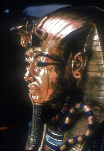 Gold mask of Tutankhamun on the second coffin. Artist: Unknown
