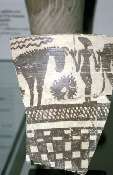 Terracotta pottery fragment of a human figure between two horses, Tepe Sialk, Iran, 4th mil. BC. Artist: Unknown