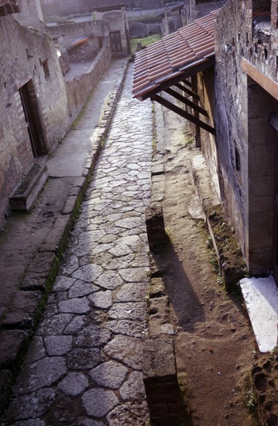 View down Cardo IV (street) from the balcony of the Casa a Graticcio, Herculaneum, Italy. Artist: Unknown