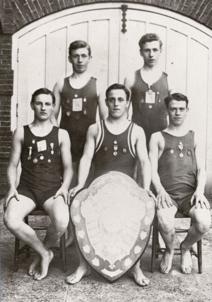 Rowntree boys life-saving team pose with the Faber Life-Saving Trophy, 1912. Artist: Unknown