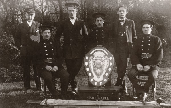 Members of the winning Rowntree Ambulance Team pose with trophy, York, Yorkshire, 24 Jan 1914. Artist: Unknown