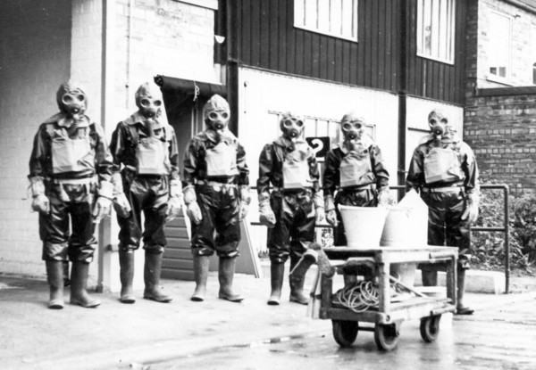 The Duncan?s factory decontamination unit dressed in their suits, Edinburgh, Scotland,1941. Artist: Unknown