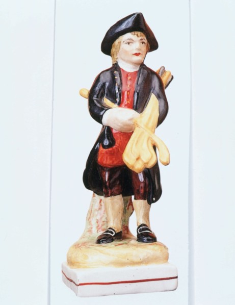 Staffordshire golfing figure, c1900. Artist: Unknown