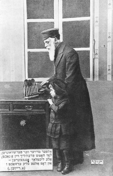 Lighting the Chanukah menorah, 1910. Artist: Unknown