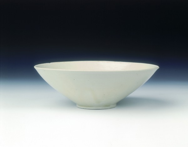 White ware bowl with moulded twin fish and floral pattern, Jin dynasty, China, 12th century. Artist: Unknown