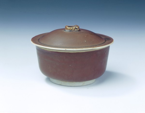 Ding persimmon red glazed covered bowl with white glazed interior, Jin dynasty, China, 12th century. Artist: Unknown