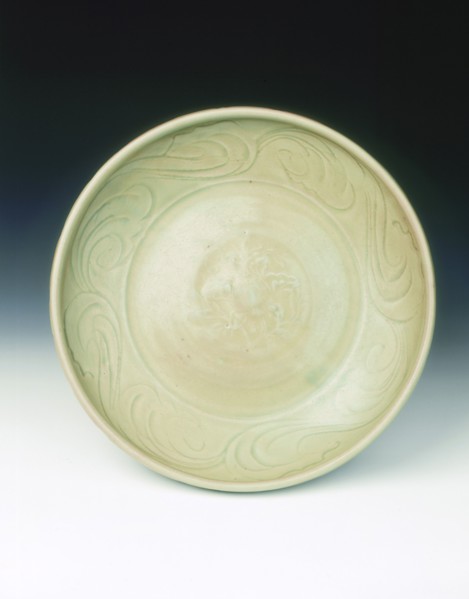 Celadon dish with moulded tree and incised scrolls, Yuan-Ming dynasty, China, 14th century. Artist: Unknown