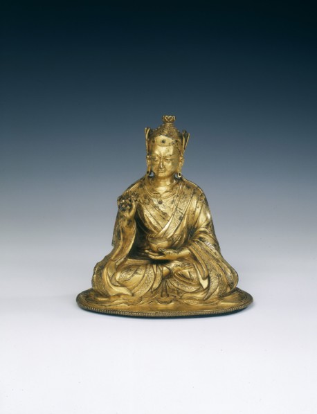 Gilt brass Padmasambhava holding attributes, Tibet, 16th-17th century. Artist: Unknown