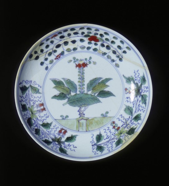 Doucai plate with pomegranate tree and floral groups, Qing dynasty, China, 1700-1722. Artist: Unknown