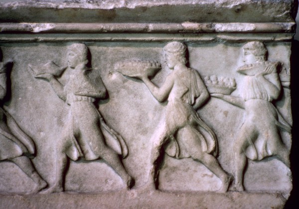 Greek relief of servants carrying food. Artist: Unknown