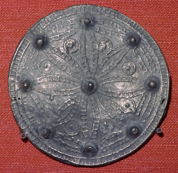 Cast lead-alloy disc brooch. Artist: Unknown