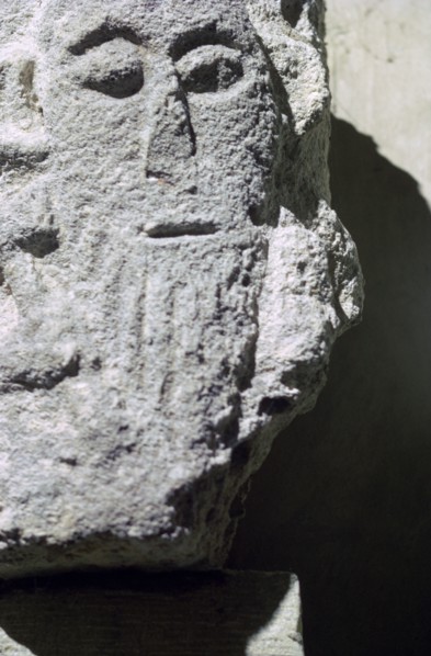 Detail of a stone head in Penmon Priory. Artist: Unknown