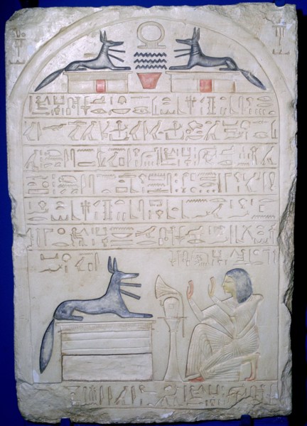 Egyptian elief stele of a man adoring Anubis. Artist: Unknown