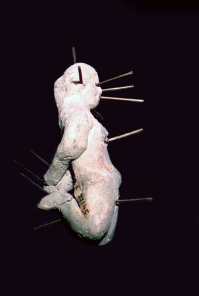 Egyptian clay figure stuck with pins. Artist: Unknown