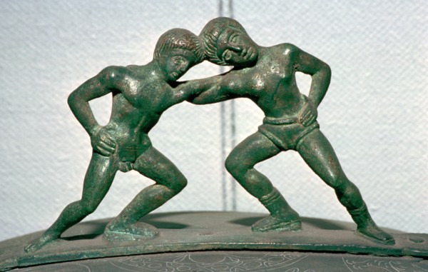 Etruscan bronze handle of a cista, showing Peleus and Thetis wrestling. Artist: Unknown