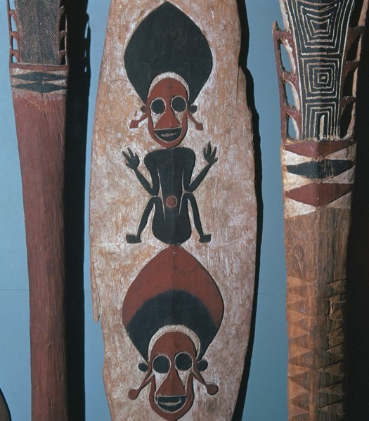 Detail of figures carved and painted on a ceremonial canoe paddle from the Solomon Islands. Artist: Unknown