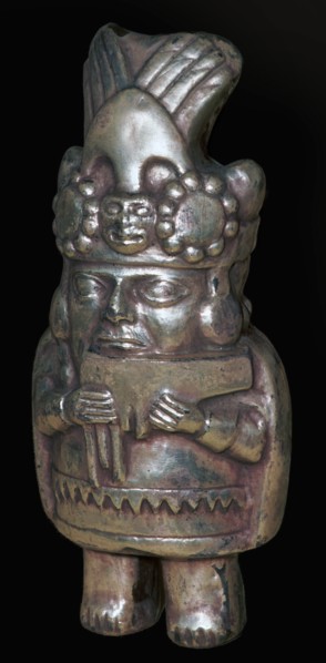 Incan silver figure of a man with pan-pipes. Artist: Unknown