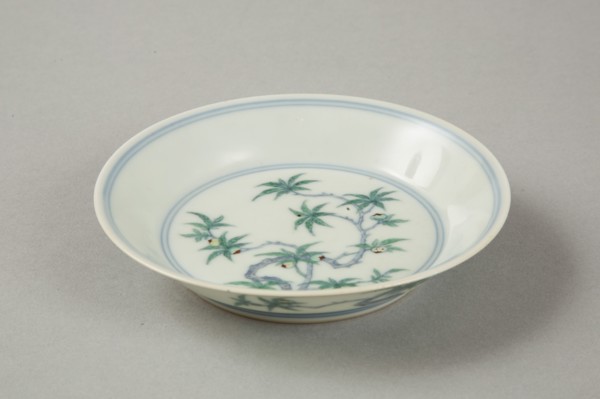Doucai saucer with fruiting peach, late Kangxi period (1700-1722). Artist: Unknown.