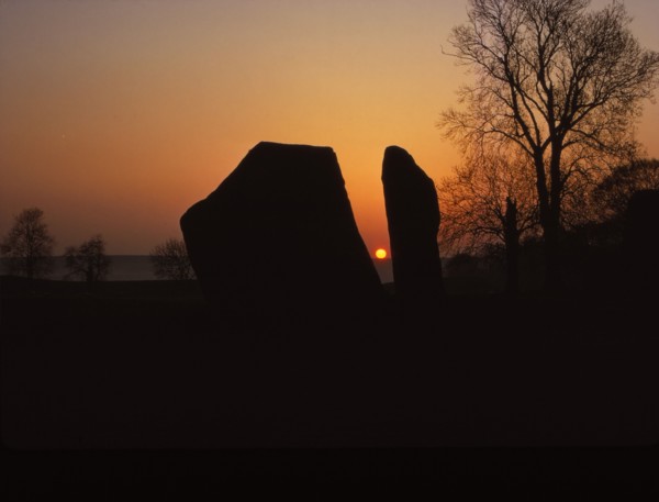 Sunrise on Megalithic Circle, Avebury, Wiltshire, 20th century. Artist: CM Dixon.