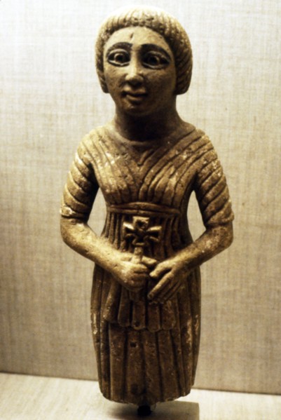 Coptic figure of woman clasping a crucifix, Sheik Ibada, Upper Egypt, 350-400. Artist: Unknown.