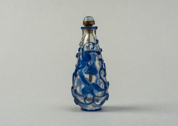 Clear glass snuff bottle with blue overlay, China, Qing dynasty, 1644-1911. Creator: Unknown.