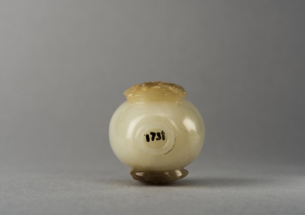 Jade snuff bottle with raised carving of animals, China, Qing dynasty, 1644-1911. Creator: Unknown.
