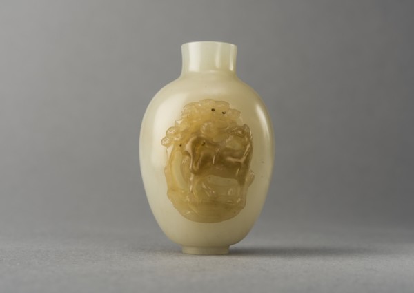 Jade snuff bottle with raised carving of animals, China, Qing dynasty, 1644-1911. Creator: Unknown.